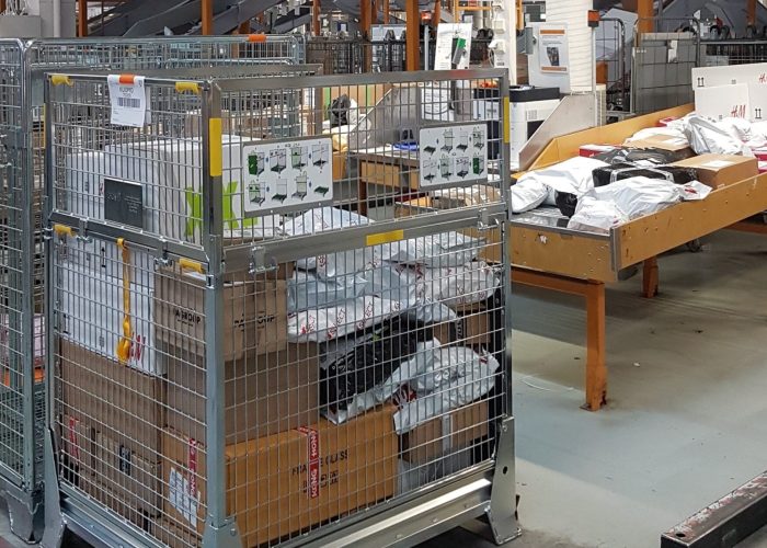 Parcel-cage-image-in-sorting-center-1756x2048
